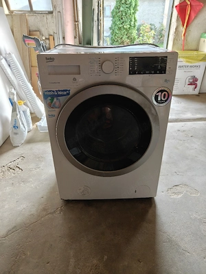 Masina de spalat rufe Beko cu uscator 