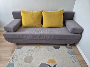 Canapea extensibilă Dalin, cu spațiu de depozitare, în stare foarte bună si covor