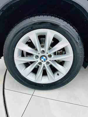 Bmw Seria X - imagine 9