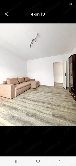 Ofer spre închiriere un apartament luminos și spațios, cu o suprafață de 50 mp, situat pe strada Tău - imagine 9
