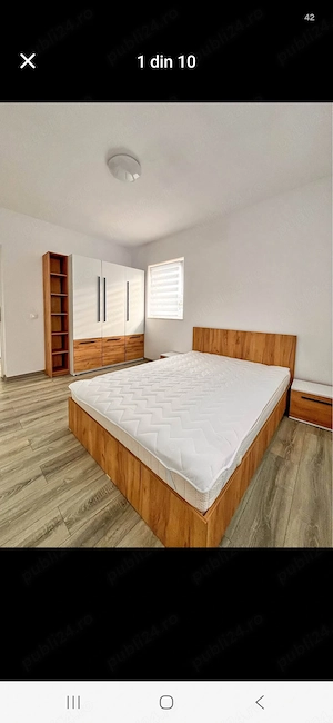 Ofer spre închiriere un apartament luminos și spațios, cu o suprafață de 50 mp, situat pe strada Tău - imagine 8