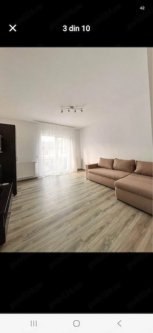 Ofer spre închiriere un apartament luminos și spațios, cu o suprafață de 50 mp, situat pe strada Tău - imagine 6