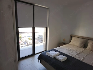 Închiriez apartament 2 camere  - imagine 2