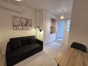 Închiriez apartament 2 camere tip studio - imagine 4