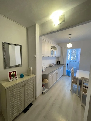 Se oferă spre închiriere apartament cu 3 camere  - imagine 7