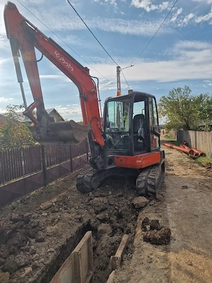Vand sau schimb miniexcavator KUBOTA 5.4 TONE cu excavator pe senile cauciuc  de 9.10 11 tone  - imagine 2