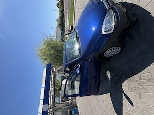 Opel Corsa 2006 - imagine 2