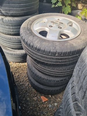 4 cauciucuri de vara 175 65 14 cu jante de aliaj 4x100 de opel0