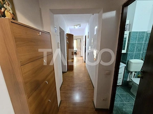 Apartament decomandat 3 camere 2 bai 66 mp parcare boxa Terezian Sibiu - imagine 2