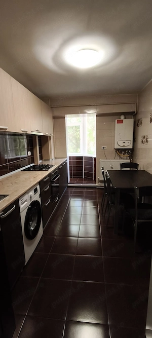 inchiriez apartament cu 2 camere zona ic frimu langa biserica sf mina 