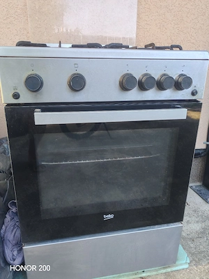 Set Aragaz integral pe gaz + Hotă 60 cm BEKO, Inox   Stare excelentă, perfect funcționale