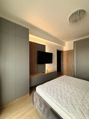 Inchiriez apartament cu 2 camere mobilat si utilat premium intr-un bloc nou, loc de parcare inclus - imagine 2