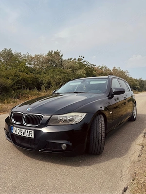 BMW e91 320d 184 cai automat - imagine 5