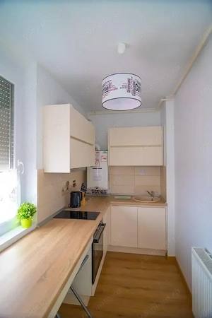 Garsoniera de inchiriat in zona Universitate ,cu centrala proprie - imagine 2