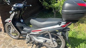 Suzuki Adress 1,25 ca Honda Innova 