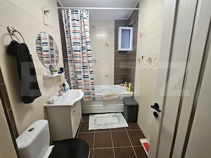 Apartament decomandat cu 3 camere, gradina proprie, parcare, in centrul Floresti - imagine 9