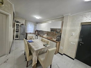 Apartament decomandat cu 3 camere, gradina proprie, parcare, in centrul Floresti - imagine 4