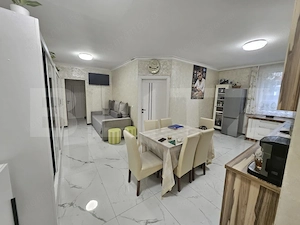 Apartament decomandat cu 3 camere, gradina proprie, parcare, in centrul Floresti - imagine 3