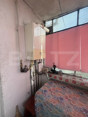 Garsonieră M3 cu balcon – ideală pentru renovare și investiție - imagine 6