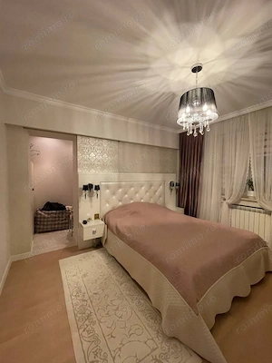 Oferim  pentru inchiriere un apartament de 3 camere situat in zona Giulesti - imagine 7