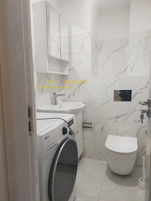 Faleza Nord - FZ-uri : Apartament două camere, două băi și două balcoane, etaj 2, renovat nou,utilat - imagine 6