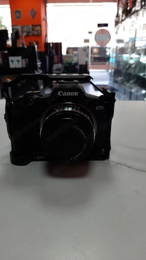 Used Products Bucuresti Aparat Foto Mirrorless Canon EOS R100 24.1MP + Obiectiv TTArtisab aps-c 23 m
