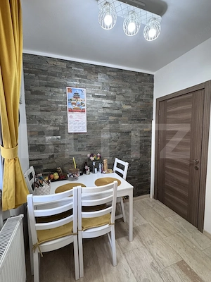 Un apartament conceput fără compromisuri, ideal pentru cei care caută rafinament - imagine 2