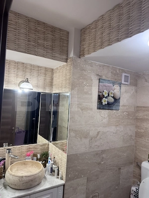 Un apartament conceput fără compromisuri, ideal pentru cei care caută rafinament - imagine 17