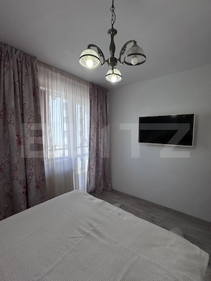 Un apartament conceput fără compromisuri, ideal pentru cei care caută rafinament - imagine 14