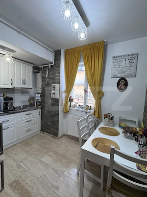 Un apartament conceput fără compromisuri, ideal pentru cei care caută rafinament - imagine 3