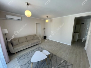 Apartament 2 camere decomandate balcon loc parcare zona Brana Selimbar - imagine 3
