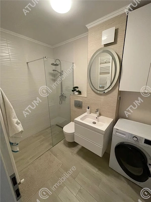 Apartament 2 camere decomandate balcon loc parcare zona Brana Selimbar - imagine 9