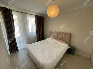 Apartament 2 camere decomandate balcon loc parcare zona Brana Selimbar - imagine 4