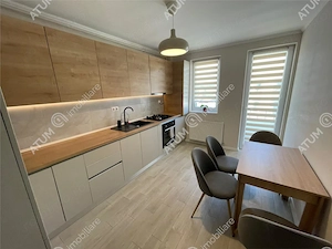 Apartament 2 camere decomandate balcon loc parcare zona Brana Selimbar - imagine 8