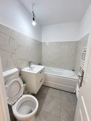 Garsoniera spatioas-Renovata integral-Potrivită pentru locuit sau investitie - imagine 8