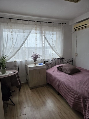 Inchiriez garsoniera cu baie in zona UMT - imagine 4
