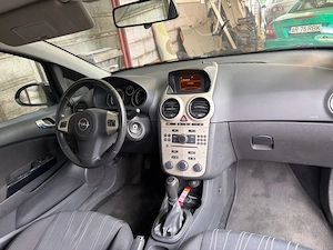 Opel Corsa D 2007 1.0 benzina  volan+scaune incalzite  isofix  clima - imagine 5