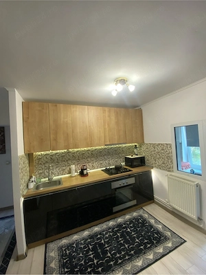Dau in chirie apartament - imagine 4