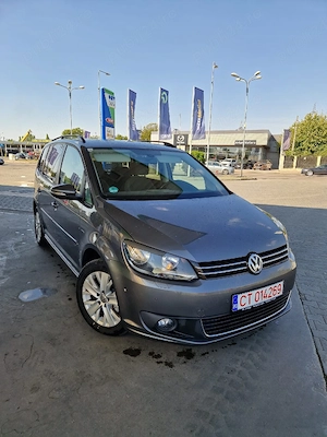 Vw Touran 2014  Automat rar efectuat