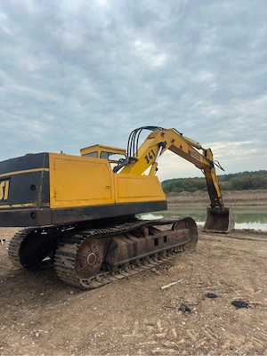 Vând excavator + rabă