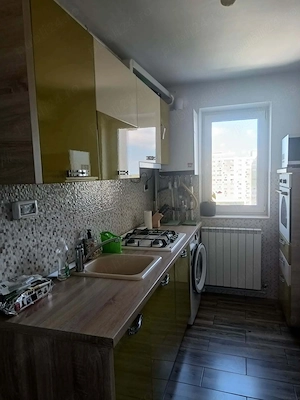 Închiriez apartament cu 2 camere