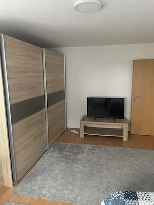 Dau in chirie apartament cu o camera transformat in doua camere , plus parcare subterana  - imagine 2