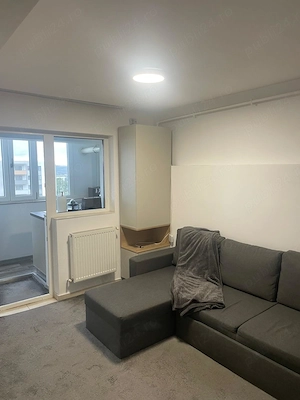 Dau in chirie apartament cu o camera transformat in doua camere , plus parcare subterana  - imagine 3