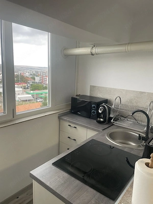 Dau in chirie apartament cu o camera transformat in doua camere , plus parcare subterana  - imagine 4