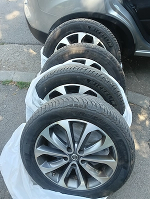 Set complet jante originale Nissan R18 + anvelope de iarnă Michelin Pilot Alpin 5