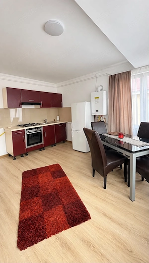 Închiriez apartament cu 2 camere - imagine 2