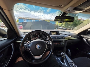 BMW Seria 3 320i - imagine 9