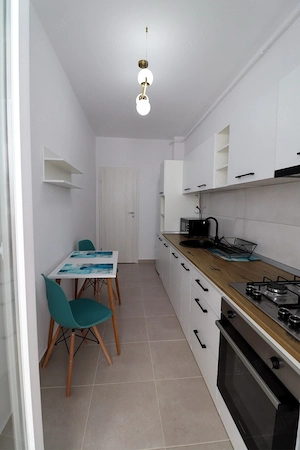 Garsoniera de inchiriat, loc de parcare inclus - imagine 3