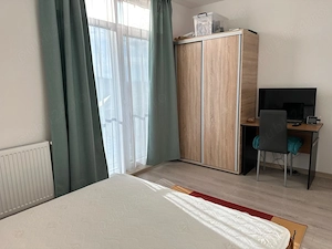 Apartament ultrafinisat si mobilat, cu parcare subterana, centrala proprie si aer condiționat - imagine 2