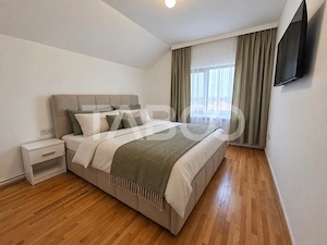 Casa individuala la prima inchiriere 4 camere terasa curte Sura Mica - imagine 6